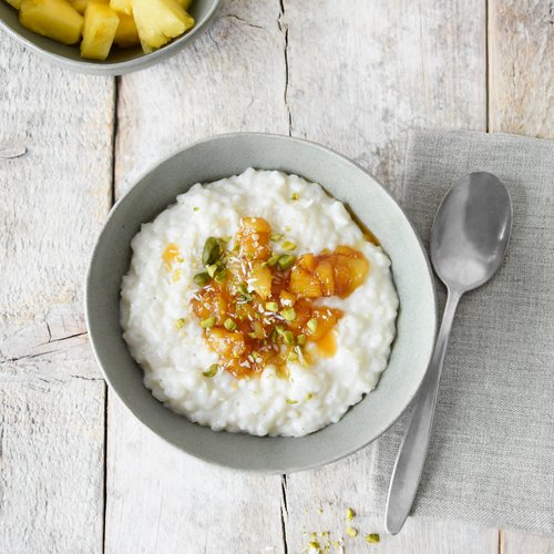 Kokos-Milchreis mit Honig-Ananas